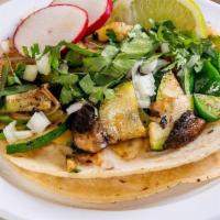 Veggie Taco (Order Of 3) · Grilled green peppers, onions zucchini and portabello mushrooms. Topped with cilantro, onion...