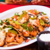 Alambre Shrimp · Shrimp sautéed with grilled onions, green peppers & bacon topped with melted white Mexican c...