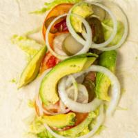 Veggie · Lettuce, Tomato, Avocado, Mushroom, Onion, Pickles with whole wheat Wrap.