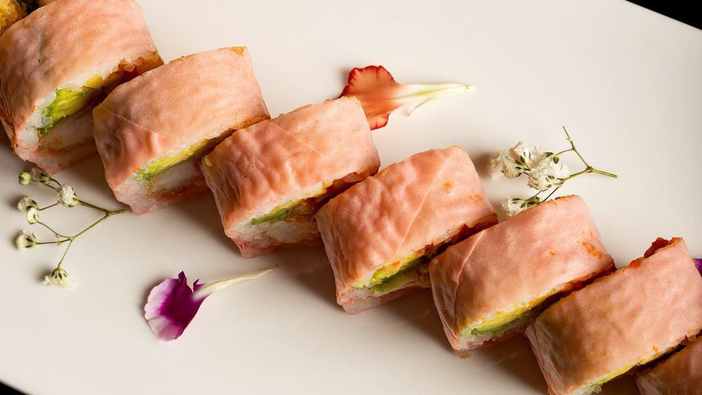 Pink Lady Roll · Spicy. Spicy tuna, shrimp tempura, lobster salad, avocado & mango inside wrapped with pink soybean paper.