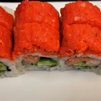 Volcano Roll · Yellowtail, salmon and jalapeño inside, with spicy tuna on top.