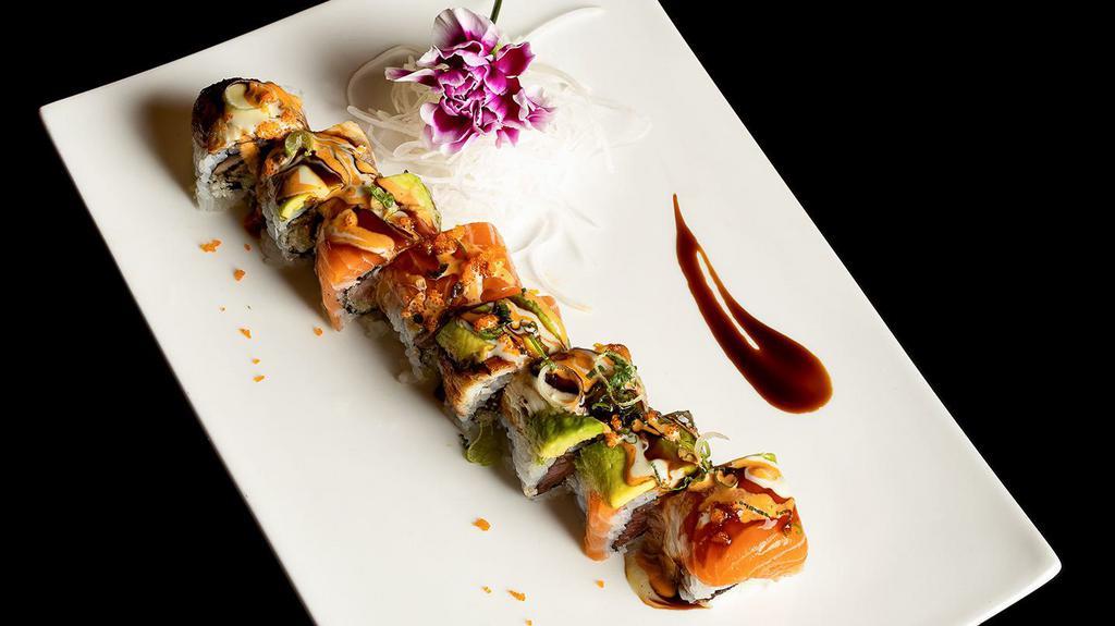 Angel Roll · Spicy. Pepper tuna, cucumber, crunchy inside, eel and salmon on the top with honey wasabi sauce, spicy sauce & eel sauce.