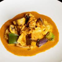 Thai Red Curry  · Spicy. Red curry with fried tofu, eggplant, mushroom, onion, basil leaf, bell pepper and the...