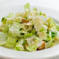 Caesar Salad · Romaine lettuce, shaved Parmesan cheese, croutons and Caesar dressing.