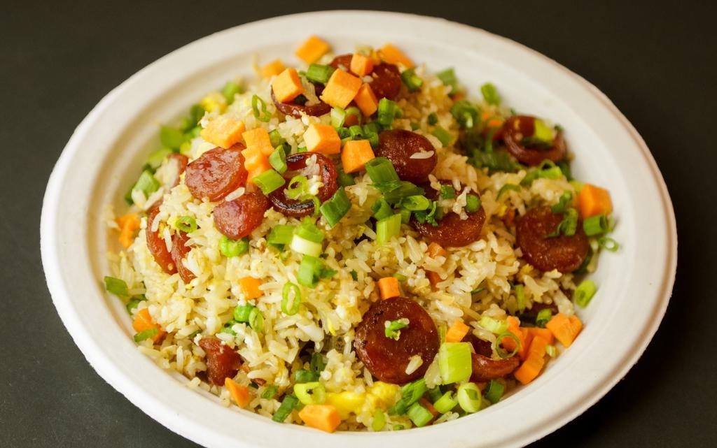 Fried Rice · Sauteed with egg, onions, carrots, and peas.