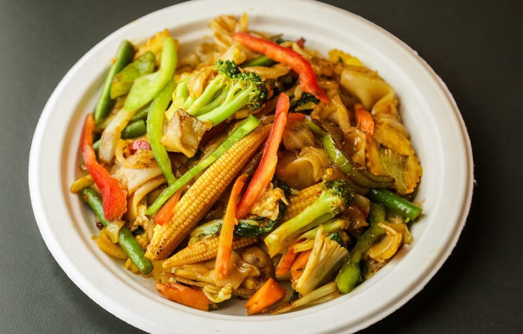 Spicy Hobo · Spicy. Broad rice noodles, onion, bell peppers, string beans and mushrooms.