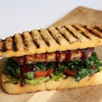 Bbq Pesto Salmon Sandwich · BBQ seared salmon, kale-basil pesto, massaged
kale, & tomato on crusty bread