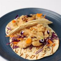 Honey Walnut Shrimp Taco · Lightly battered and fried shrimp tossed in
creamy honey sauce, with candied walnuts, and
ca...