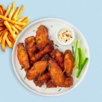 6-Piece Wings · Fresh chicken wings fried until golden brown. Your choice of one flavor.