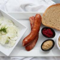 Kielbasa Platter · Smoked kielbasa, hot kraut, one side, mustard, beet spread and sliced rye.