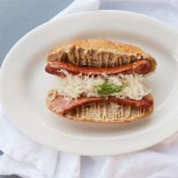 Grilled Kielbasa Sandwich · Authentic polish sausage served on a rye roll with kraut or mustard.