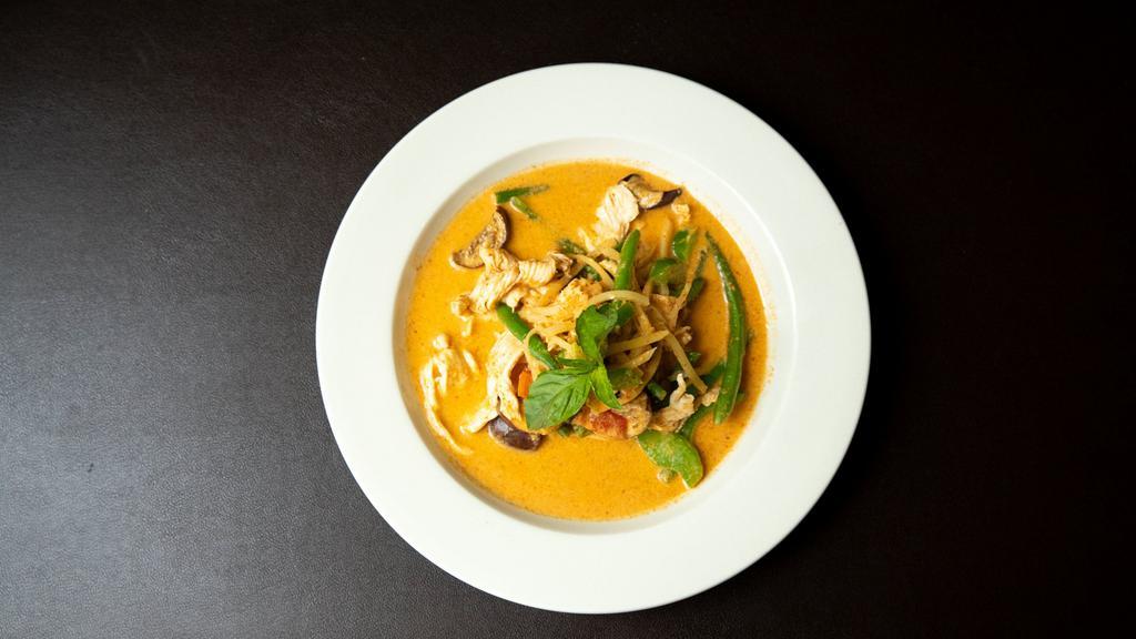 Red Curry · Bamboo shoot, bell pepper, eggplant, basil, and coconut milk. Hot and spicy.