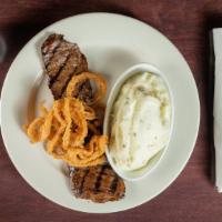 Petite Skirt Steak · served with choice of French fries or mashed potatoes.