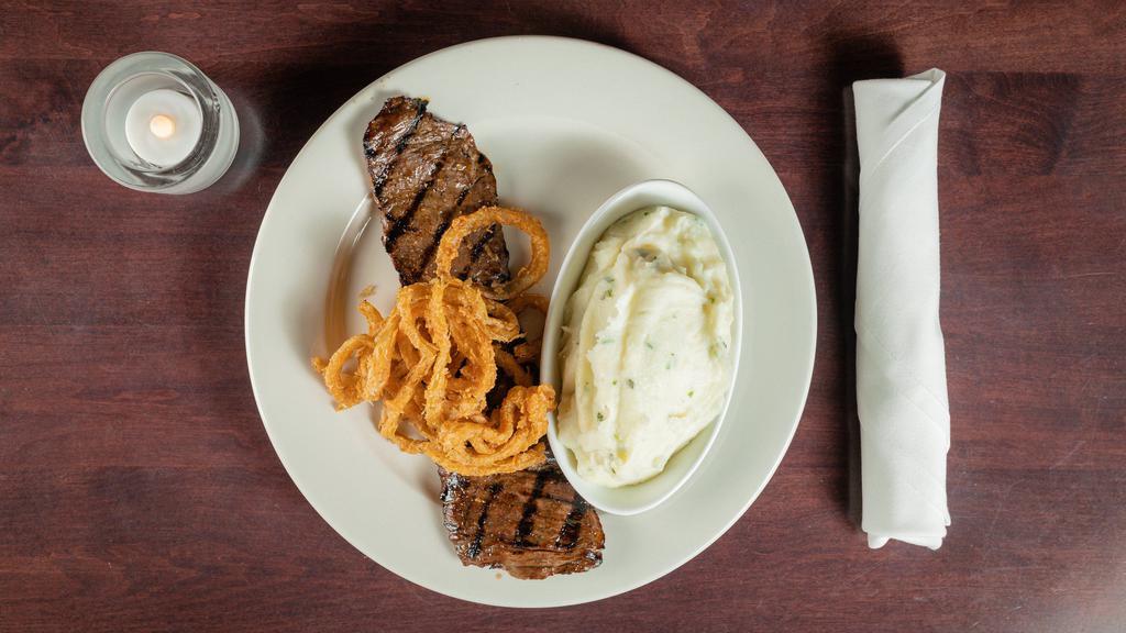 Petite Skirt Steak · served with choice of French fries or mashed potatoes.