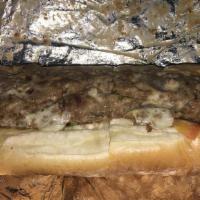 California Cheesesteak · Steak, American cheese, lettuce, tomato, and raw onions. Thinly-sliced Philly style steak se...