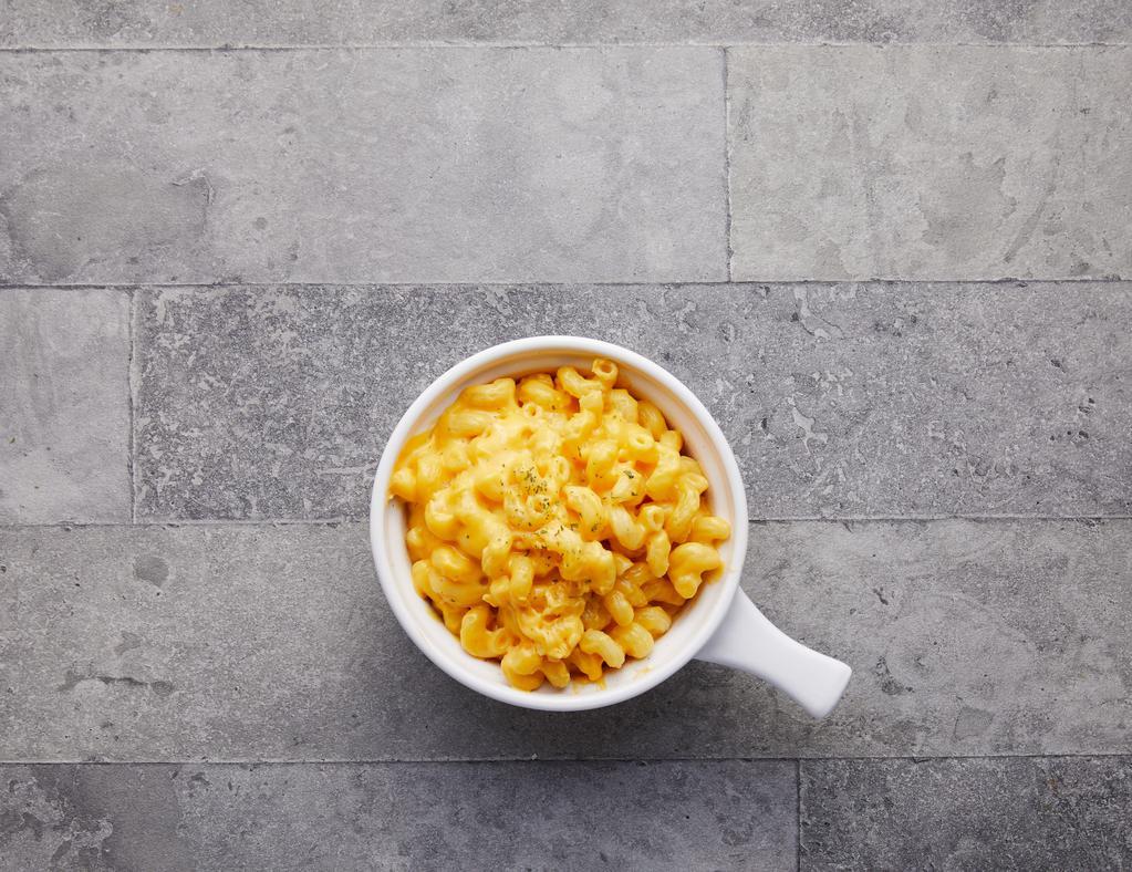 Mac And Cheese · Elbow Macaroni made with American Cheese and Cream.