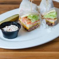 Club Burger · American cheese, lettuce, tomato, pickles, and house made Thousand Island Dressing. Cut in f...