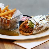 Gyro Sandwich · Served on pita with lettuce tomato and onion.