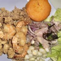 Chicharron De Mariscos · Deep-fried seafood served with onion salad.