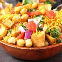 Aloo Chana Chaat Salad · Chickpea salad with potatoes, onions, tomatoes and herbs mixed in spices with lemon juice dr...