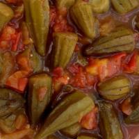 Okra يخنة بامية · Okra, onion, tomato paste, garlic, Arabic spices. Served with Turkish rice.