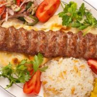 Seekh Kabab كباب كفتة · Minced lamb or chicken, onion, red bell pepper, garlic, parsley, cilantro, mix spices. Serve...