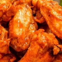 Buffalo (Hot) Wings  · Served with your choice of two sides.