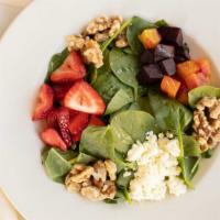 Upcountry Salad · Fresh spinach, beets, caramelized walnuts, feta cheese, Kula strawberries. Balsamic vinaigre...