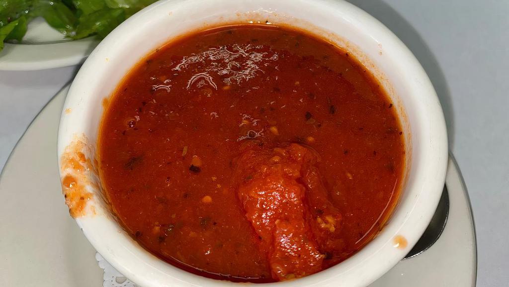 Meatball Soup · Ground beef balls, tomato sauce, basils.