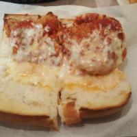 Chicken Parmesan · Chicken cutlet (fried), topped with our homemade tomato sauce and melted mozzarella cheese.