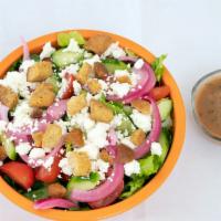 Greek Salad · Romaine, croutons, feta, grape tomatoes, cucumbers, and pickled red onions suggested dressin...