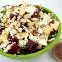 Organic Apple And Roasted Beet Salad  · Organic apples & roasted beet salad over mixed greens topped with feta and blanched almonds....