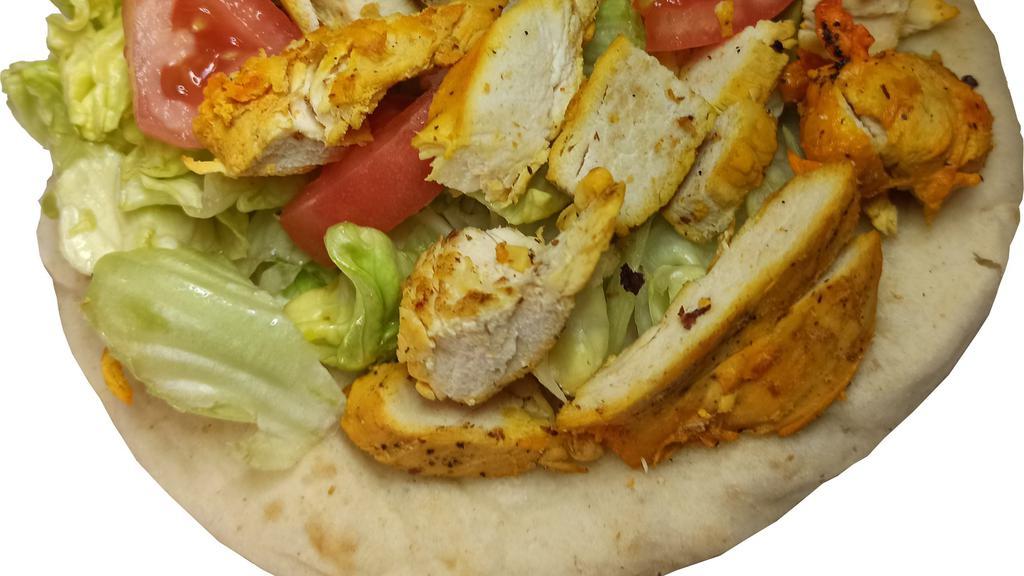 Chicken Gyro · Grilled Chicken Topped with Lettuce Tomatoes ,White Sauce and Hot Sauce, all served on a Pita Bread.