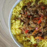 Steak Over Rice · Basmati Rice Lettuce Tomatoes Topped with Grilled Beef Steak, Grilled Onions ,Peppers and yo...