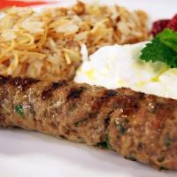 Kofta Platter · Ground  Grilled Beef  Kofta spiced ,Basmati Rice, Lettuce, Tomatoes and your choice of Sauce