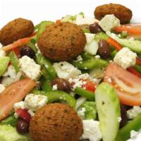 Falafel Over Salad · 5 Falafel Balls  over Lettuce Tomatoes and your choice of Toppings