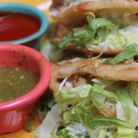 Gorditas · Two house-made corn tortillas filled with Monterey Jack and Chihuahua cheeses, lettuce, and ...