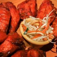 Mexican Hot Wings · Mexican Style Chicken Wings Tossed in Our Special Hot Sauce, Served with Citrus Slaw, Ranch ...