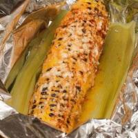 Grilled Mexican Corn · Smothered with Chipotle Mayo, Chili Powder and Queso Fresco.