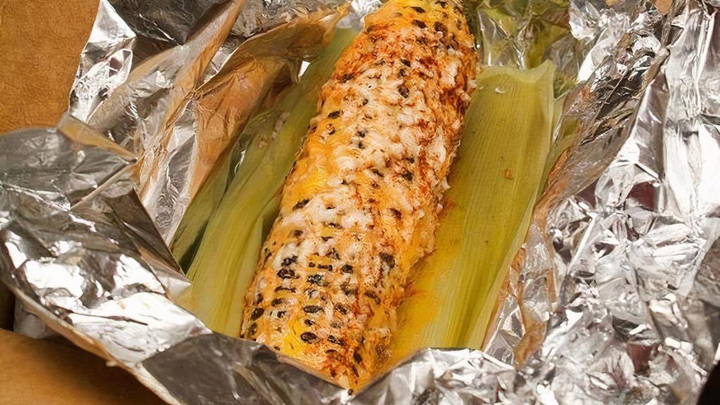 Grilled Mexican Corn · Smothered with Chipotle Mayo, Chili Powder and Queso Fresco.