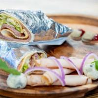 Sicillian Wrap · Grilled chicken, mozzarella cheese, green peppers, onions.