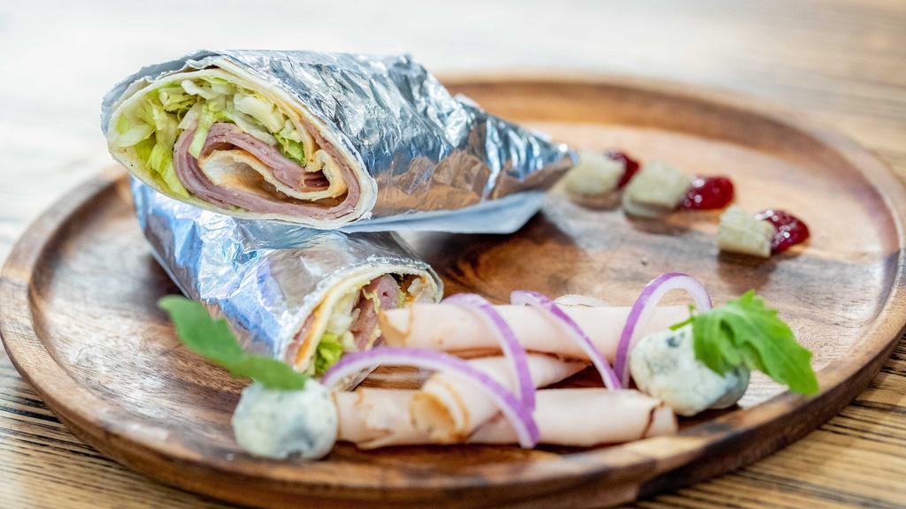 Sicillian Wrap · Grilled chicken, mozzarella cheese, green peppers, onions.