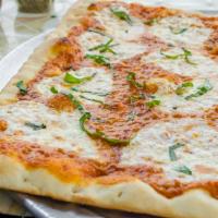 Drunken Grandma · Vodka Sauce, Fresh Mozzarella and Basil on a thin crust square