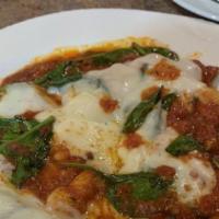 Chicken Parmigiana Pizza · Breaded chicken, mozzarella and sauce.