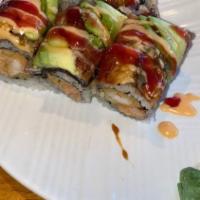 Dancing Dragon Roll · Shrimp tempura and lobster topped with eel and avocado served with spicy mayo, eel and raspb...