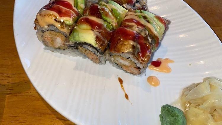 Dancing Dragon Roll · Shrimp tempura and lobster topped with eel and avocado served with spicy mayo, eel and raspberry sauce.