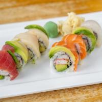 Deluxe Rainbow Roll · King crab, lobster and cucumber topped with assorted raw fish and avocado.