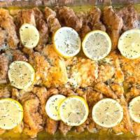 Chicken Francese · Dipped in egg, sautéed with white wine, lemon and butter.
