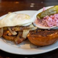Texas Burger Deluxe · Fried egg, bacon, and sauteed onions.