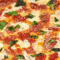 Margherita Pizza · Mozzarella, tom sauce, basil, and olive oil.